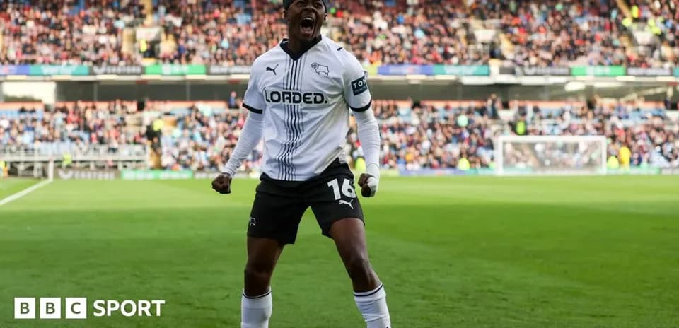 Player celebrating on the pitch during a match