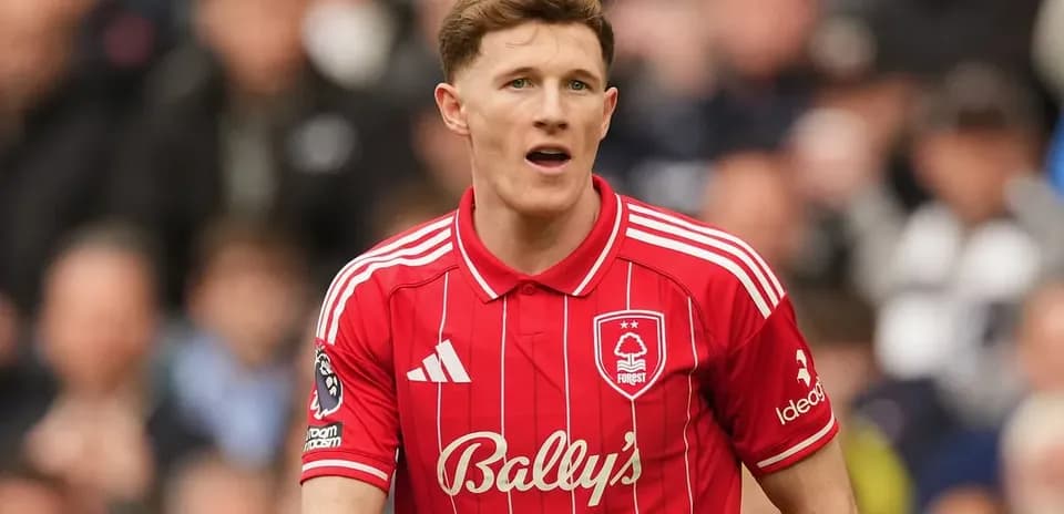 Player in red Nottingham Forest jersey on pitch