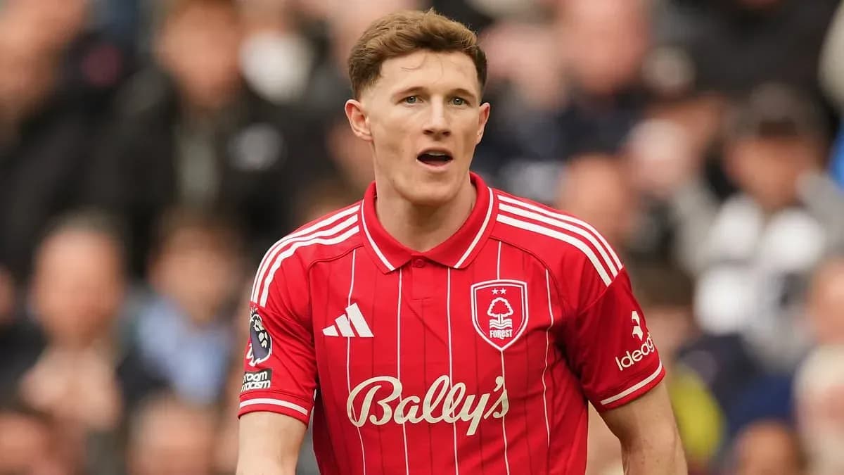 Player in red Nottingham Forest jersey on pitch