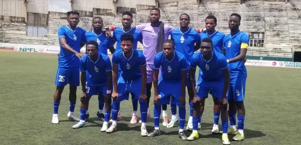Rivers United team posing before match