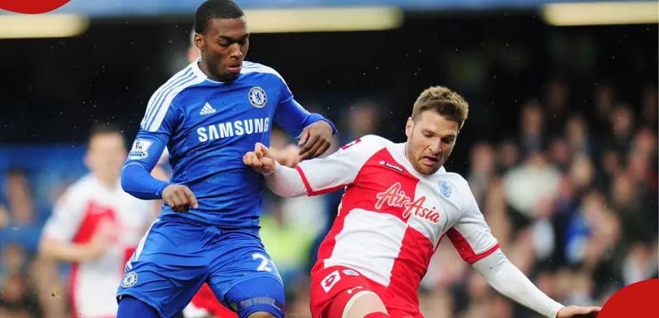 Two players competing for the ball during match