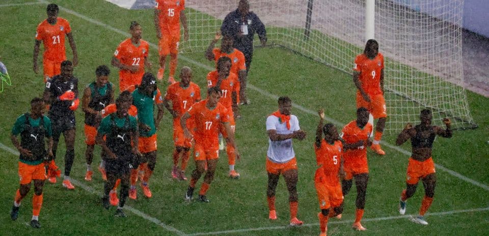 Ivory Coast players celebrating after a match