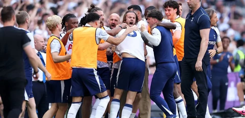Tottenham players celebrating a goal during match