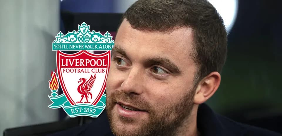 Man with beard next to Liverpool FC logo