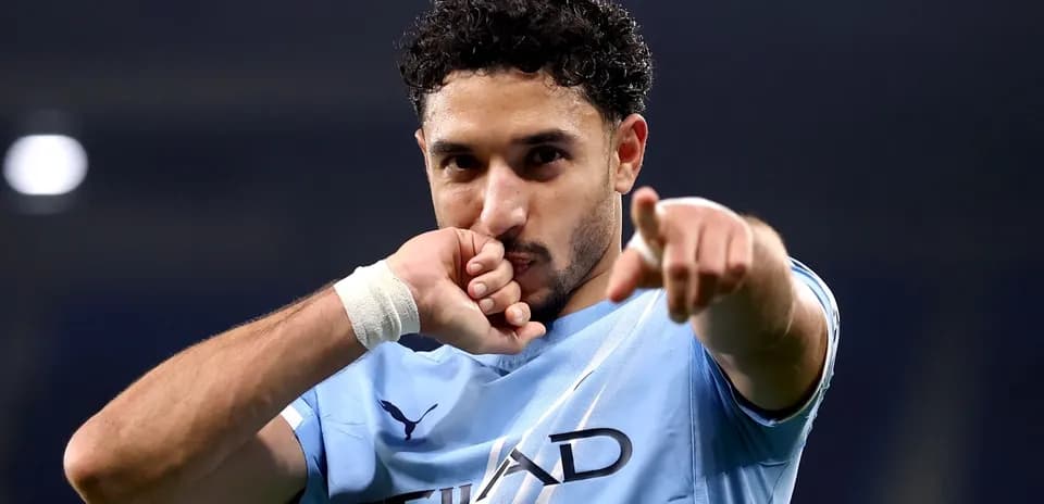 Player celebrating and pointing during match