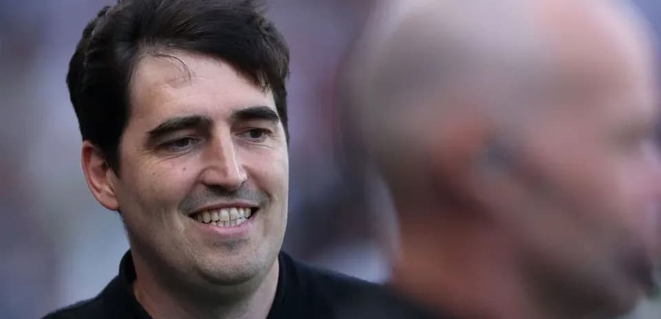 Man smiling during a sports event