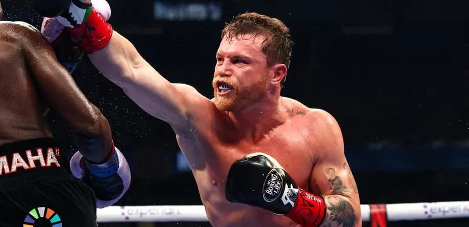 Boxer throwing a punch during a match