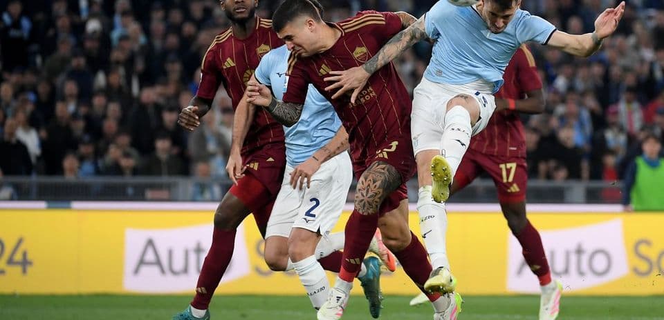 Players contesting during AS Roma vs Lazio match