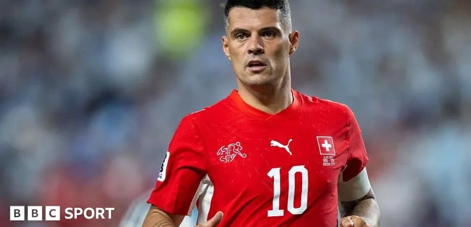Player in red jersey during football match