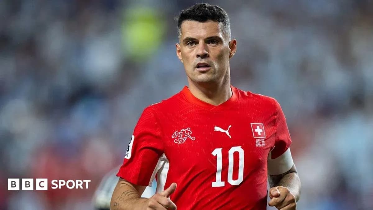 Player in red jersey during football match