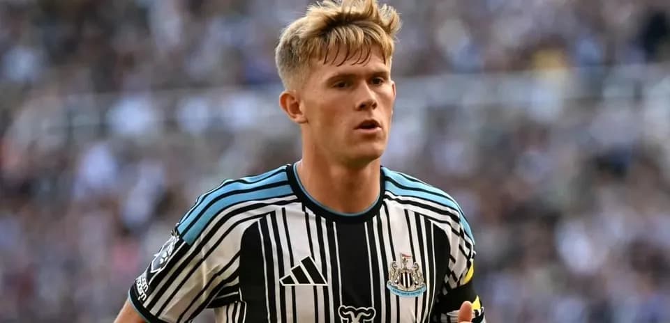 Player wearing Newcastle United jersey during match