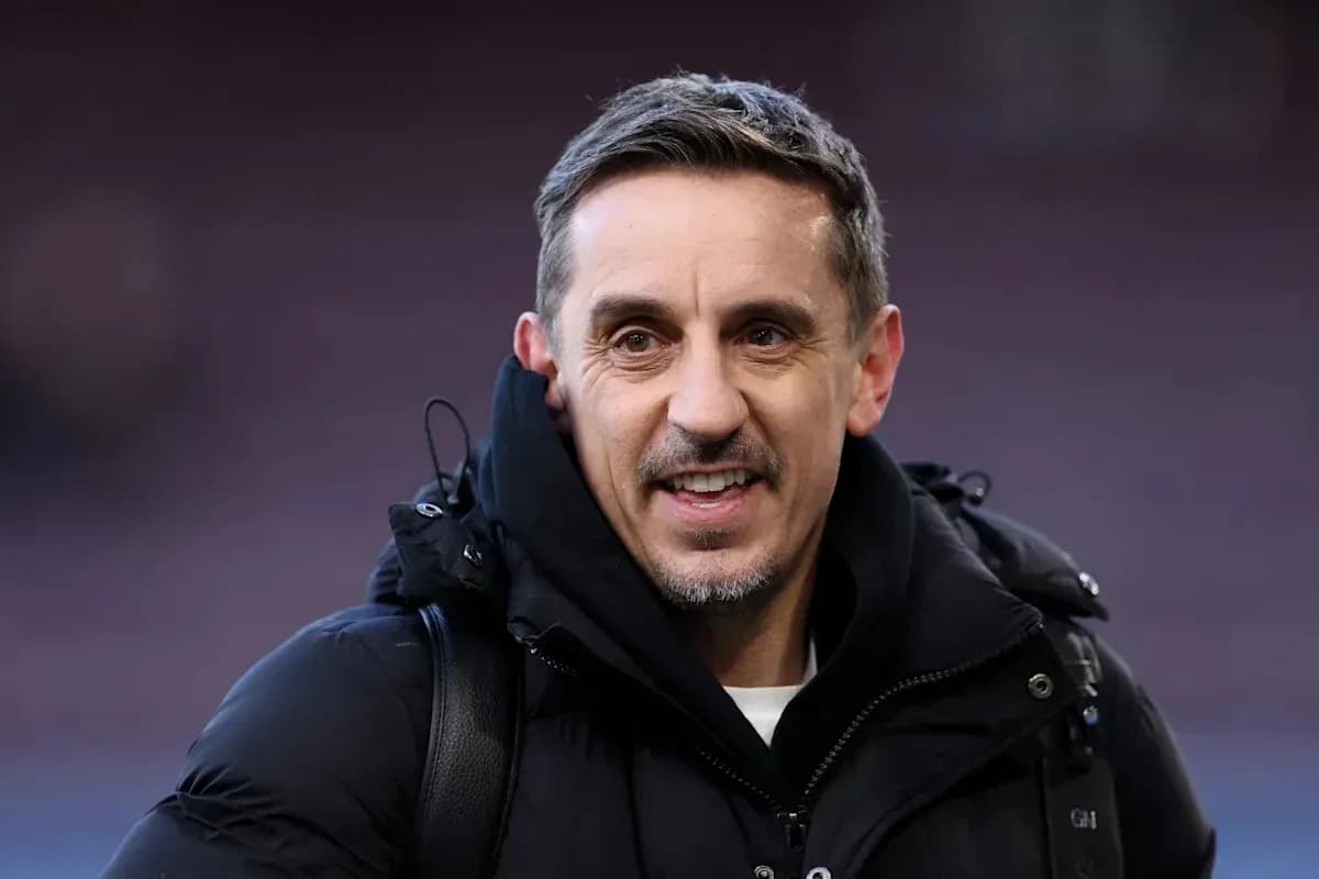 Man smiling while wearing a black jacket