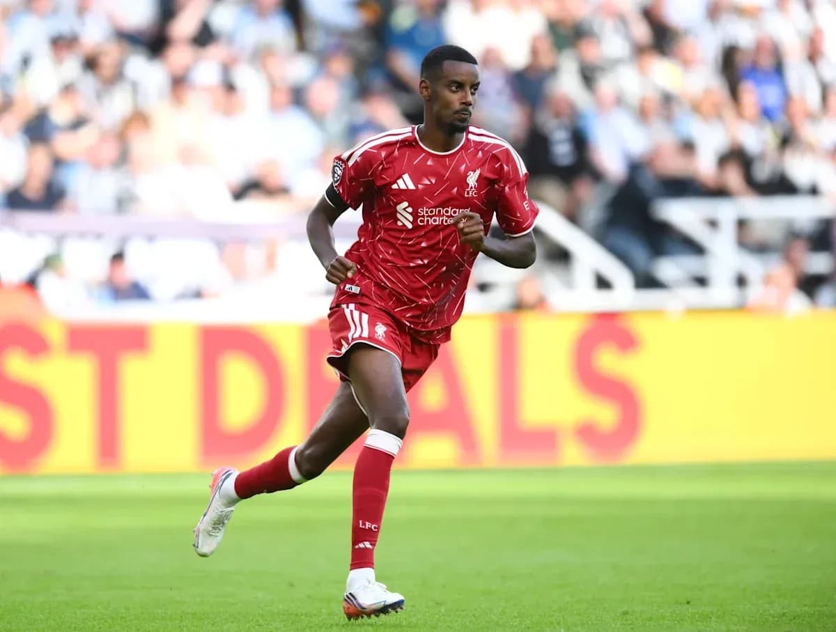 Player running during match in red Liverpool kit