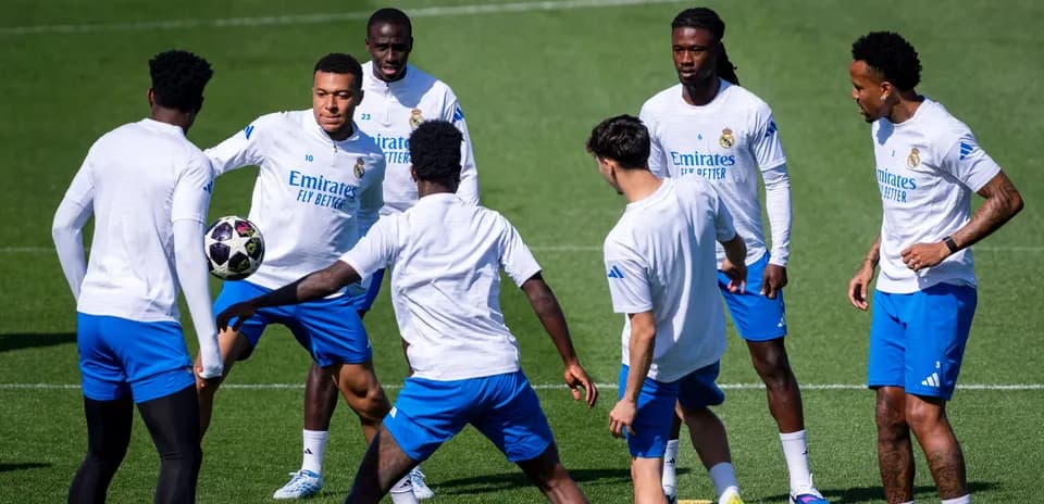 Players training and playing keep-away with a ball