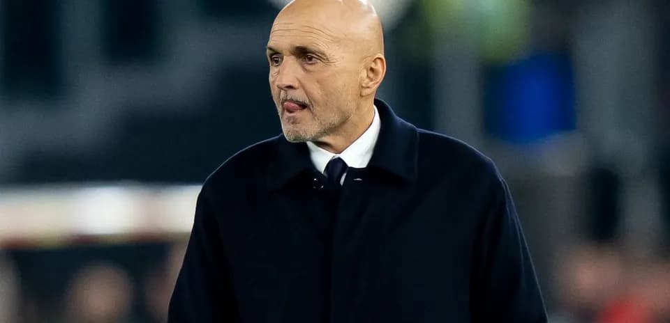 Coach walking on the sidelines during match