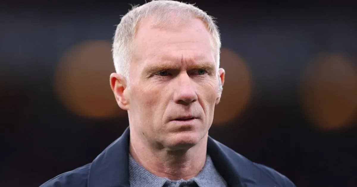 Close-up of a man with short hair and serious expression