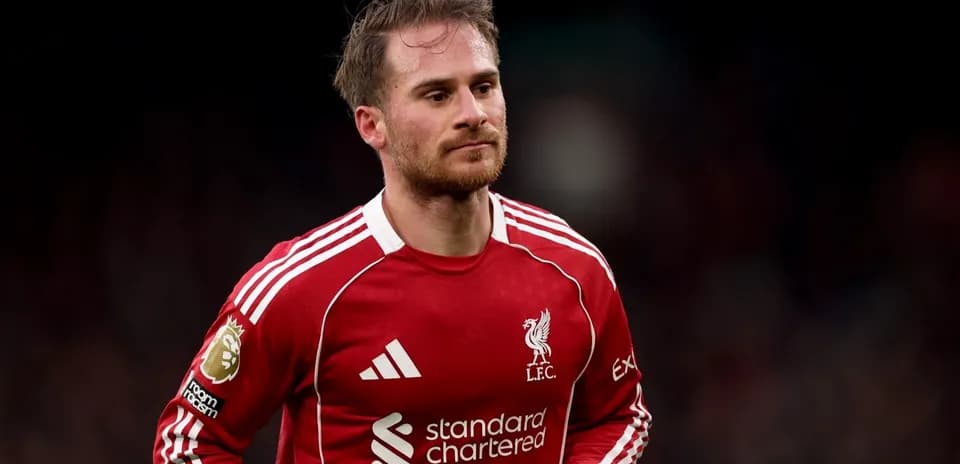 Player in Liverpool FC jersey on the field