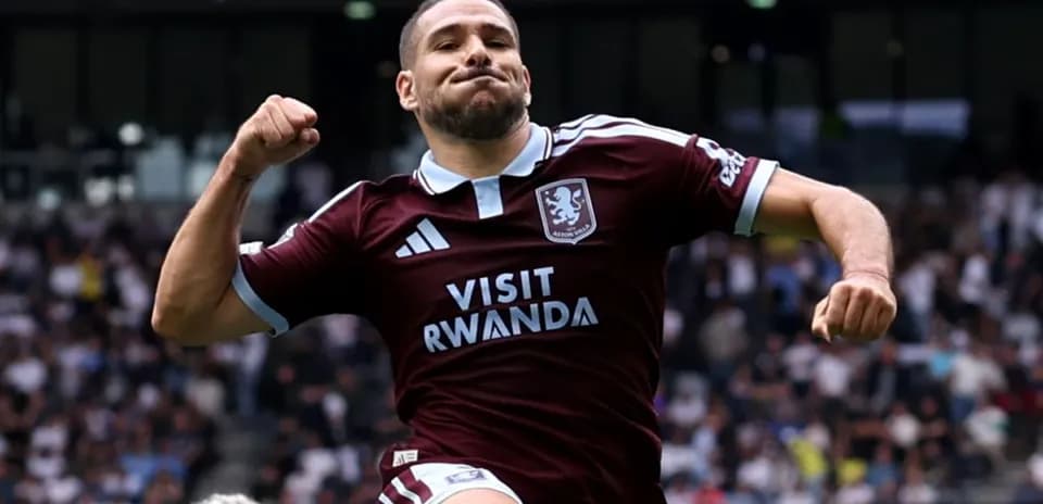 Player celebrating after scoring a goal for Aston Villa