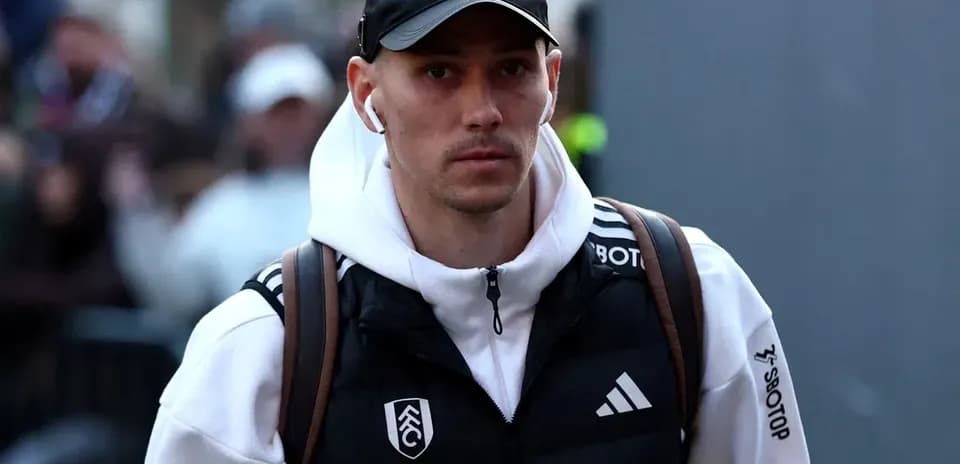 Player arriving at the stadium in casual attire