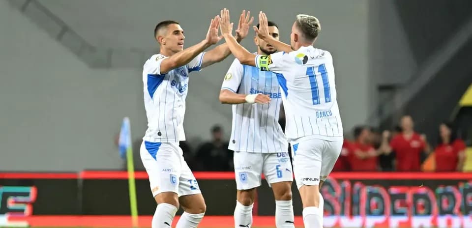 Players celebrating a goal during UEFA match