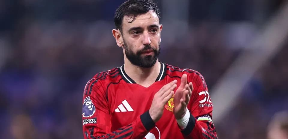Bruno Fernandes applauding fans after match