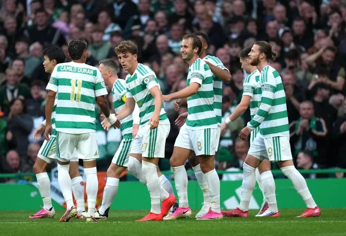 Celtic players celebrating a goal together