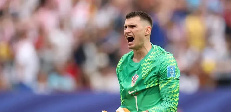 Goalkeeper celebrating during a match with fans