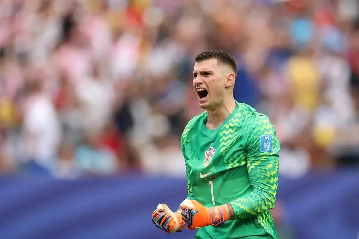 Goalkeeper celebrating during a match with fans