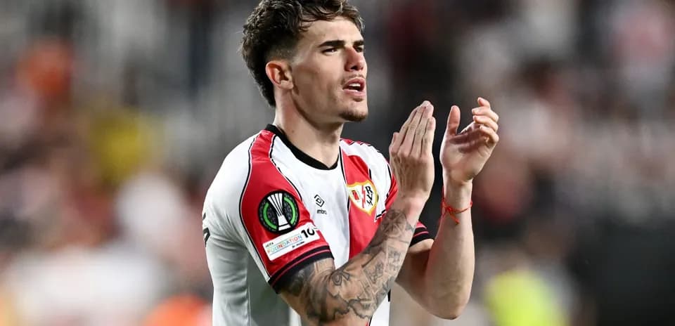 Player applauding fans during match at stadium