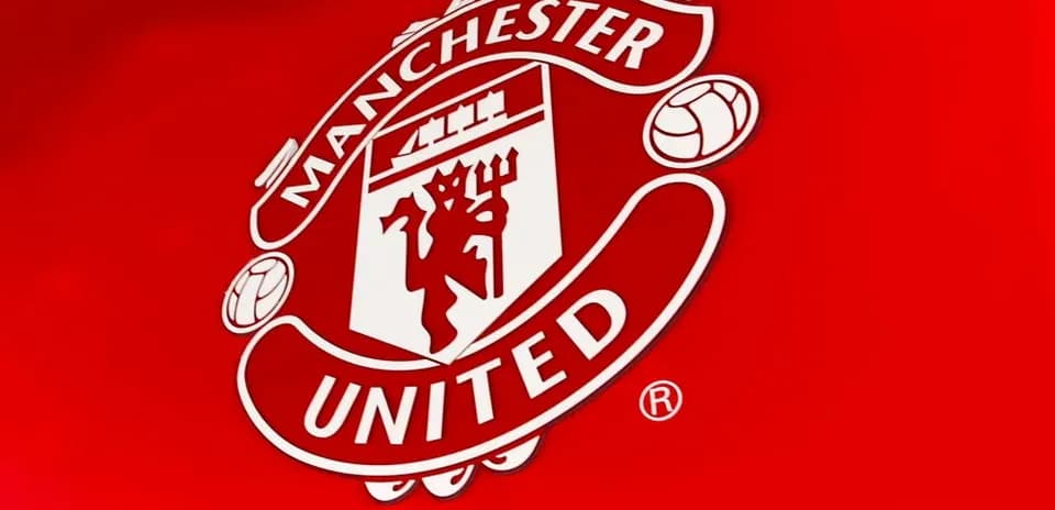 Manchester United club logo on red background