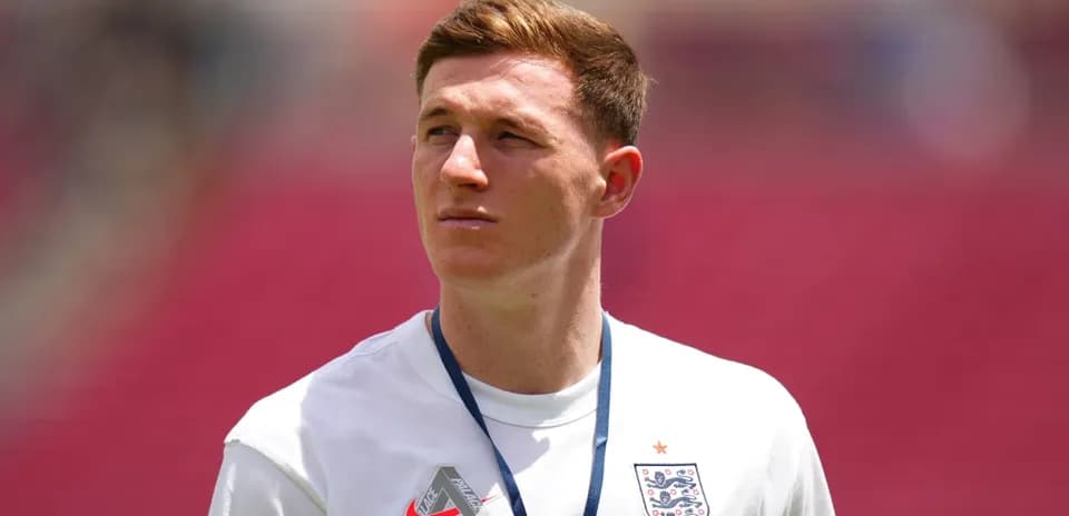 Player wearing England shirt during warm-up session