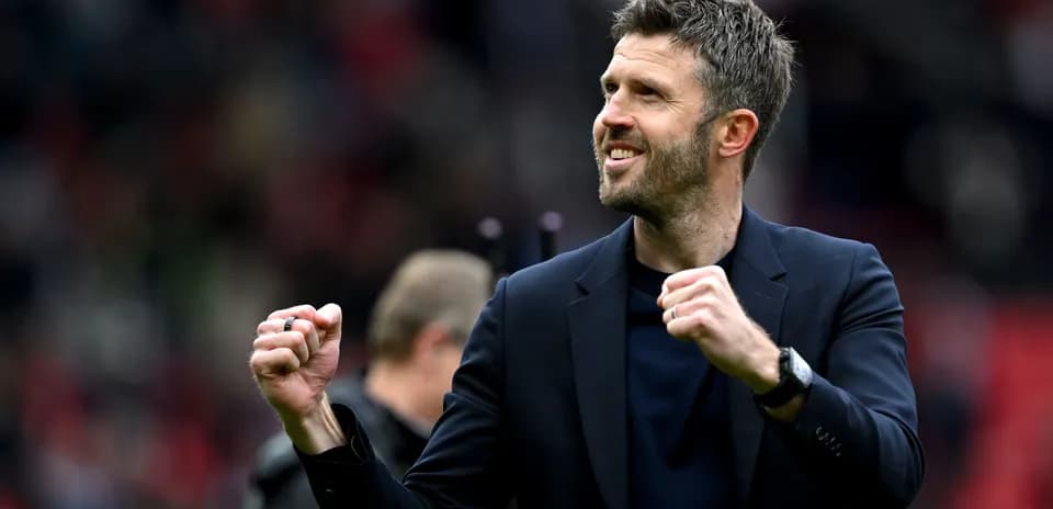 Manager celebrating victory with clenched fists