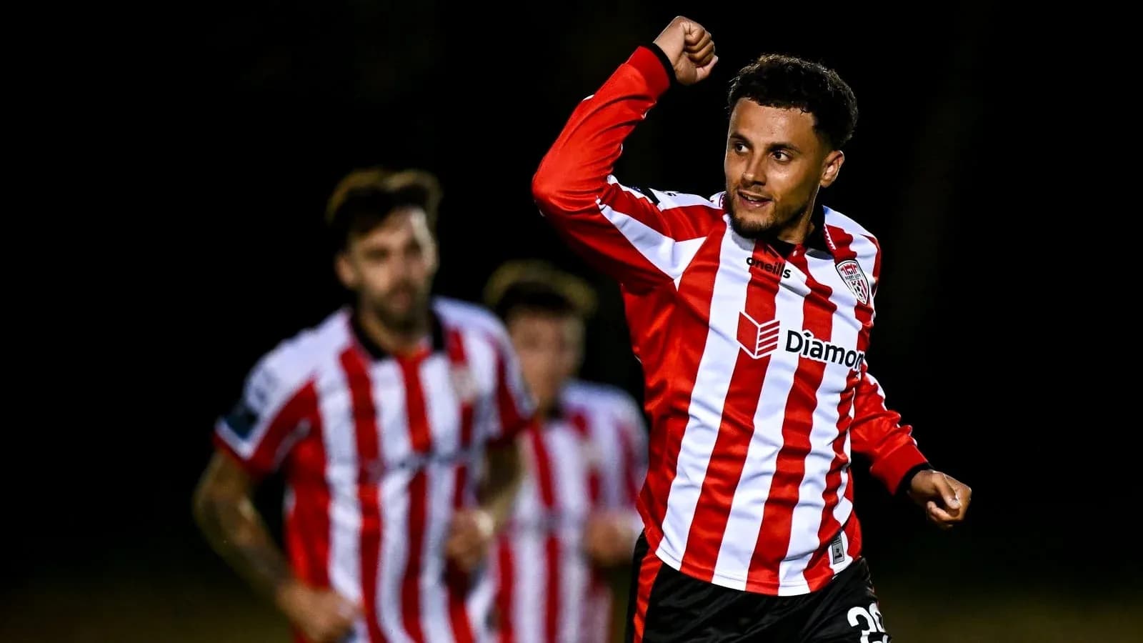 Player celebrating after scoring a goal during match