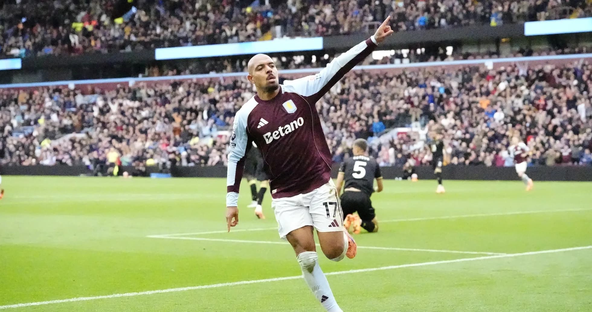 Aston Villa player celebrating a goal