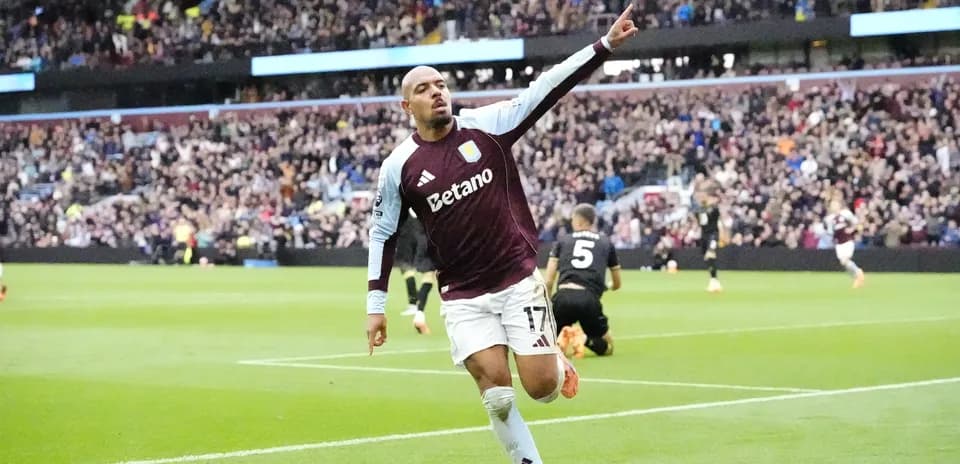 Aston Villa player celebrating a goal