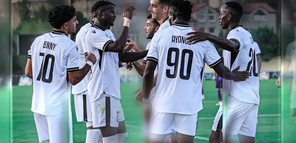 Players celebrating a goal during match