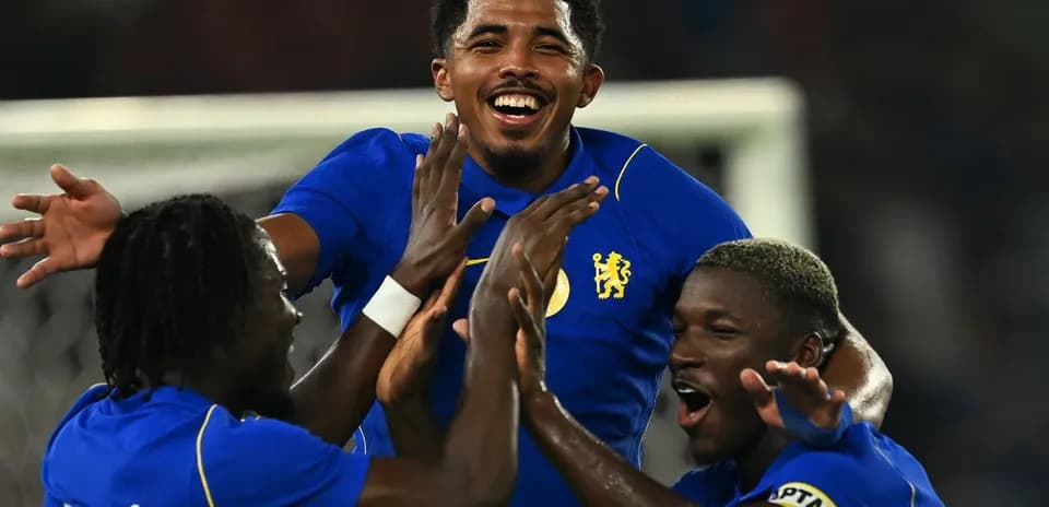 Chelsea players celebrating a goal during match