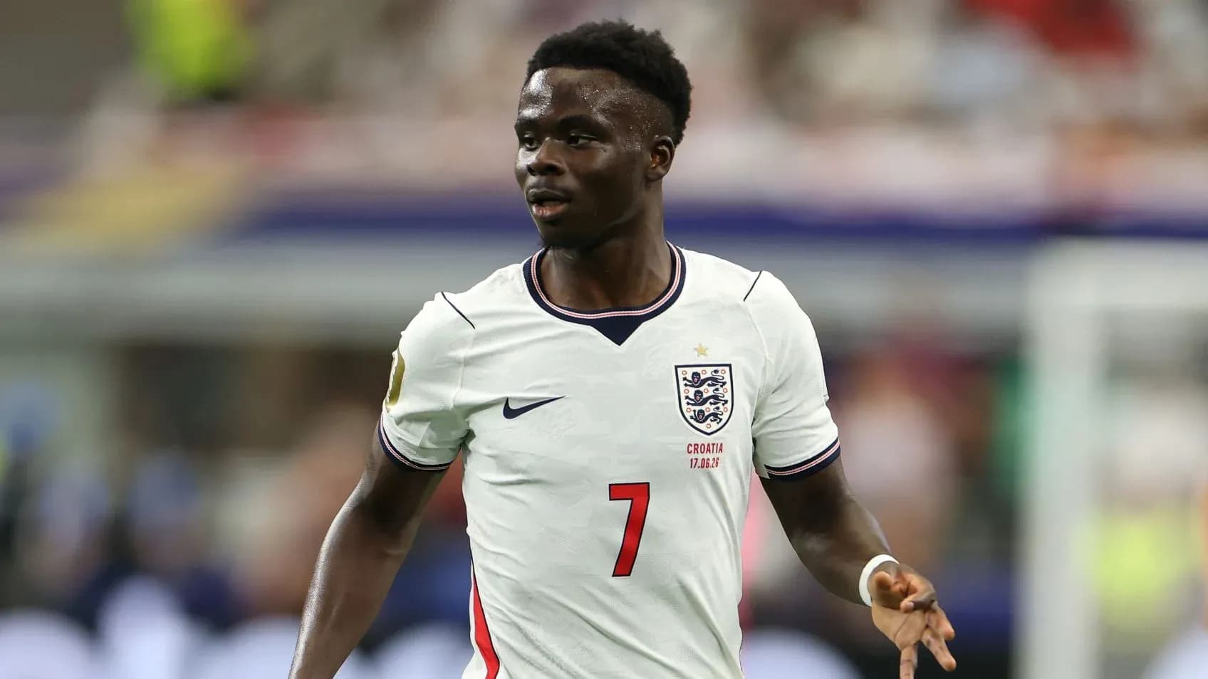 Player wearing England jersey during match action