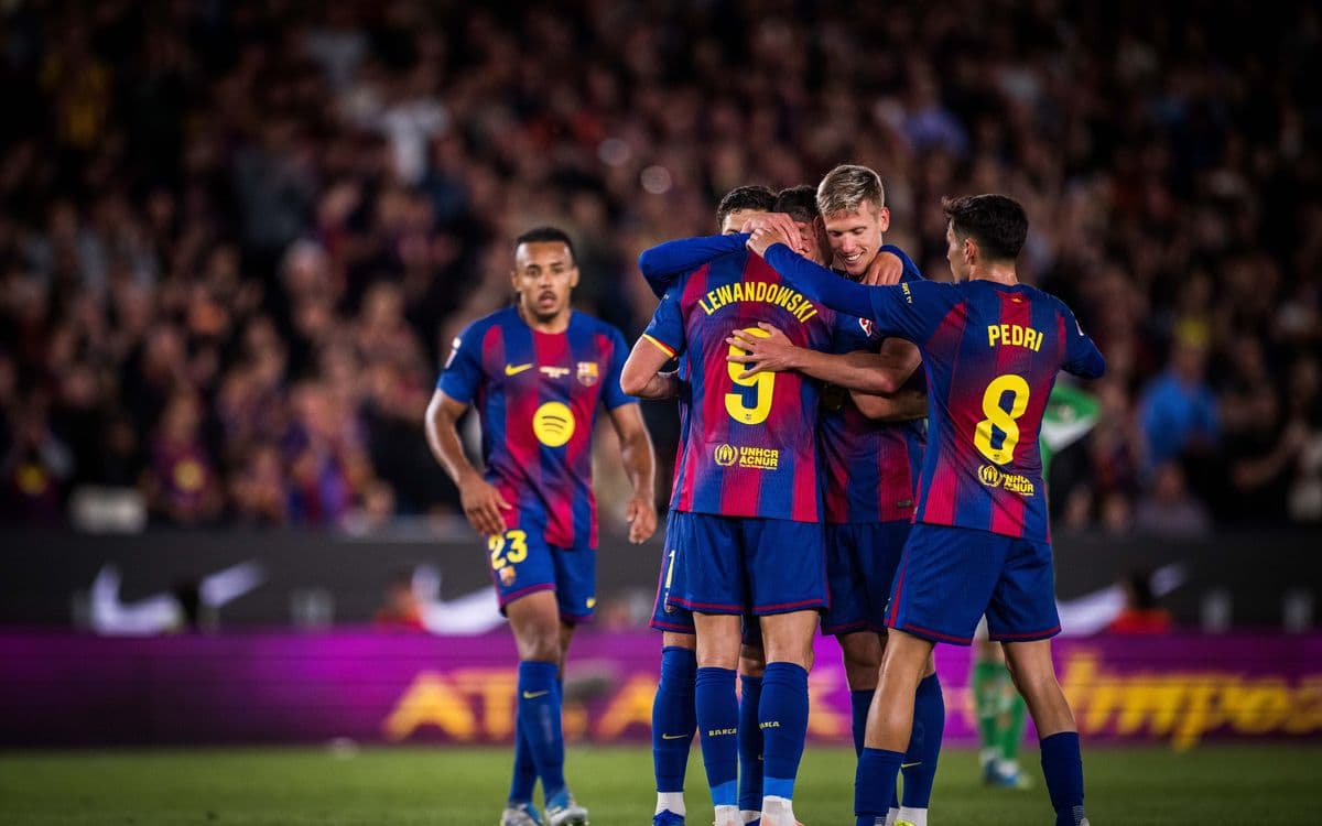 Barcelona players celebrating a goal during match