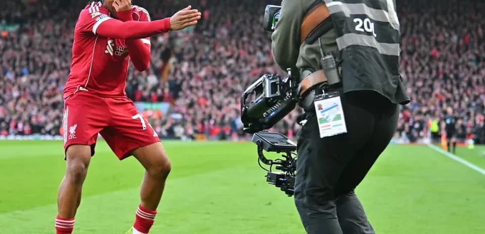 Player celebrating during Liverpool match