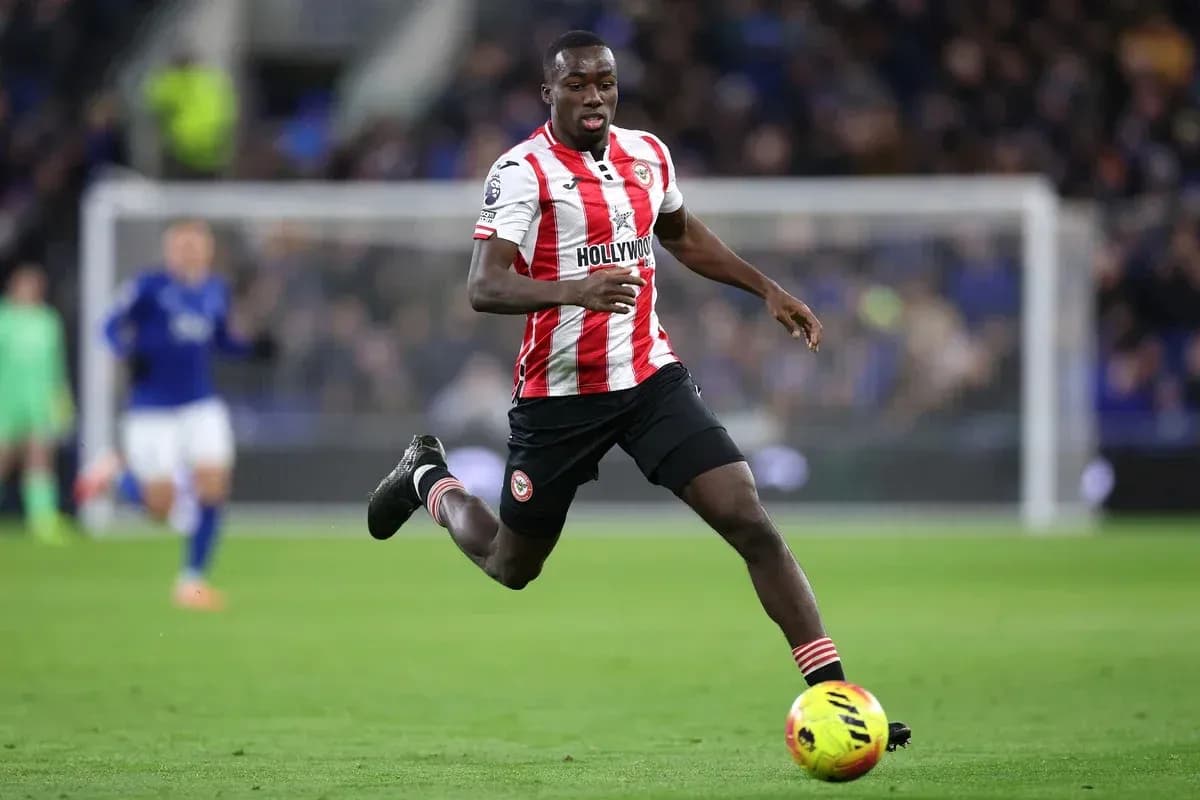 Brentford player running with the ball during match