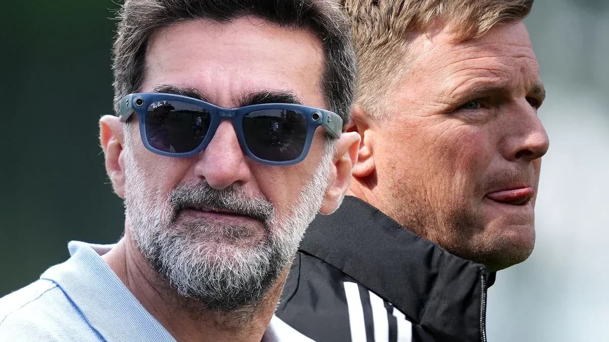 Two football coaches during training session