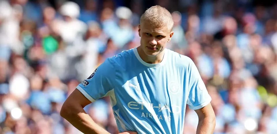 Player in light blue jersey on the field