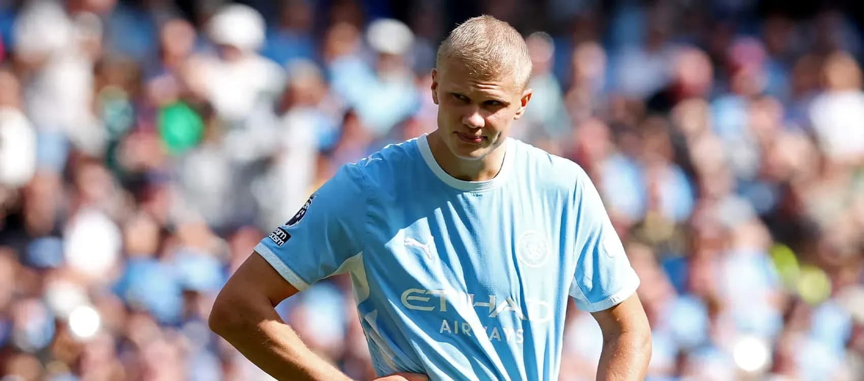 Player in light blue jersey on the field