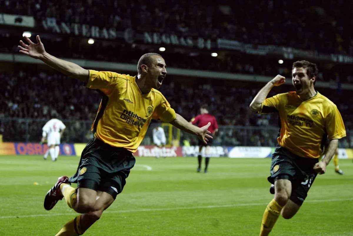 Players celebrating a goal on the field