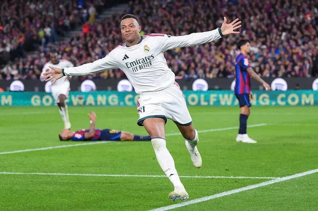 Player celebrating after scoring during El Clásico
