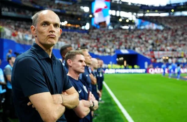 Coach observing the match from the sideline