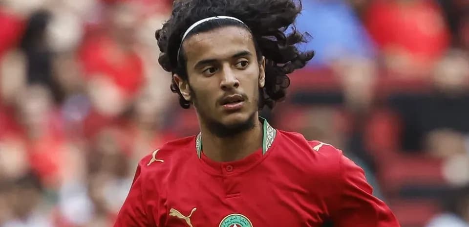 Player in red Morocco jersey during match