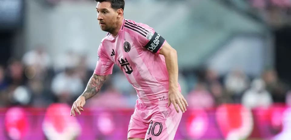 Lionel Messi playing for Inter Miami in pink uniform