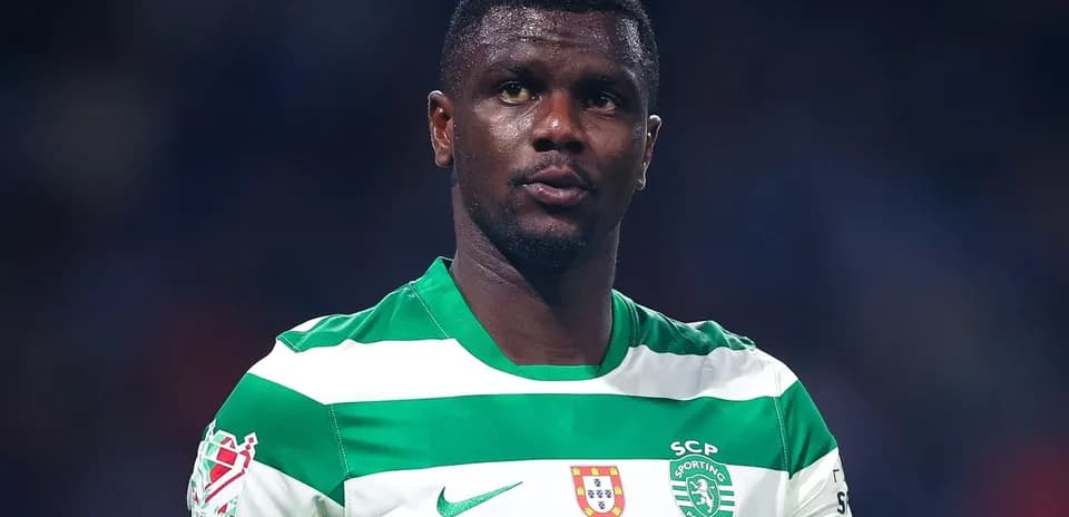 Player in green and white striped jersey on field